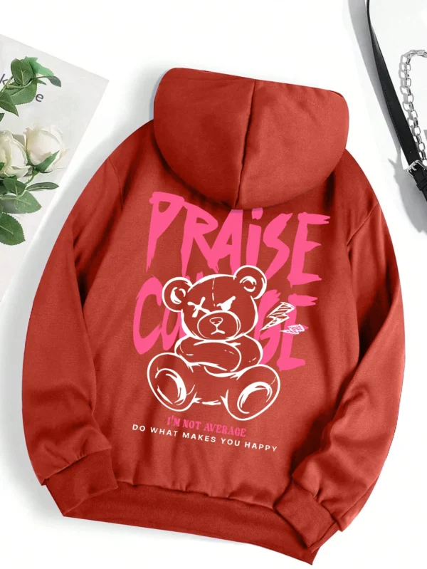 Woman wearing cute bear print fleece-lined hoodie warm autumn streetwear sweatshirt.