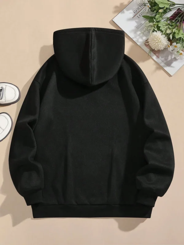 Woman wearing the warm fleece-lined 'I'm Just A Girl' pullover hoodie against a neutral background.