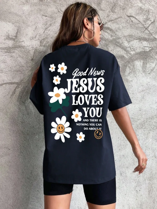 Woman wearing comfortable O-neck "Jesus Loves You" Christian graphic t-shirt for summer against a plain background.