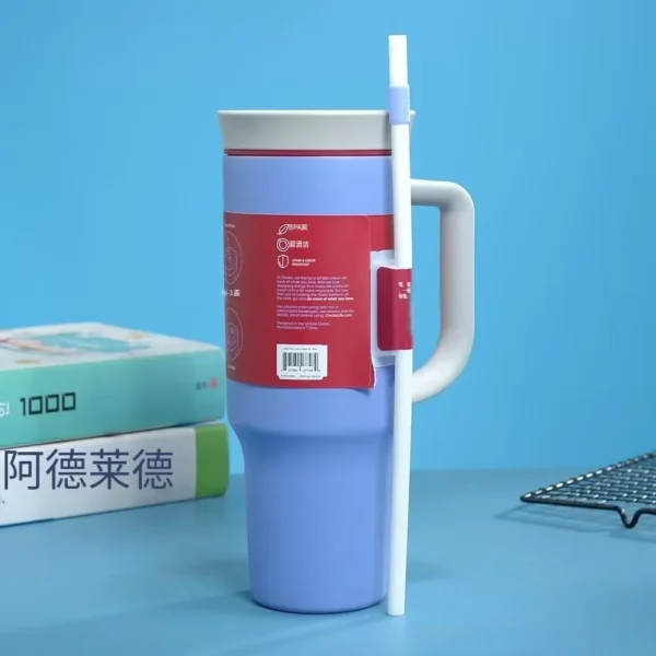 Owala Free Sip 40 oz stainless steel water bottle with straw lid.