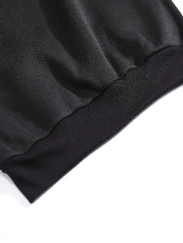 Women's oversized crewneck sweatshirt in a neutral color with a large black cute smile cartoon print on the front.